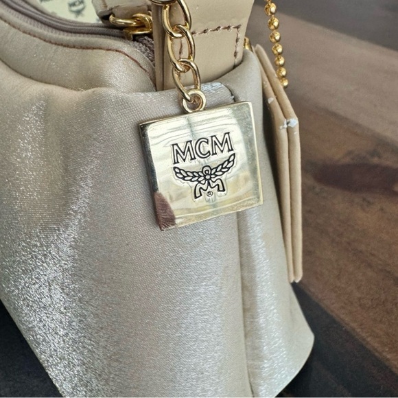 MCM Mini Top Handle Bag
Champagne Monogram Leather - Picture 7 of 15